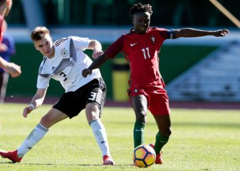 VILA REAL SANTO ANTONIO, PORTUGAL - FEBRUARY 11: Moritz Reuther (L) of Germany U16 challenges Joelson Fernandes (R) of Portugal U16 during UEFA Development Tournament match between U16 Germany and U16 Portugal at VRSA Stadium on February 11, 2019 in Vila Real Santo Antonio, Portugal. (Photo by Ricardo Nascimento/Getty Images)
