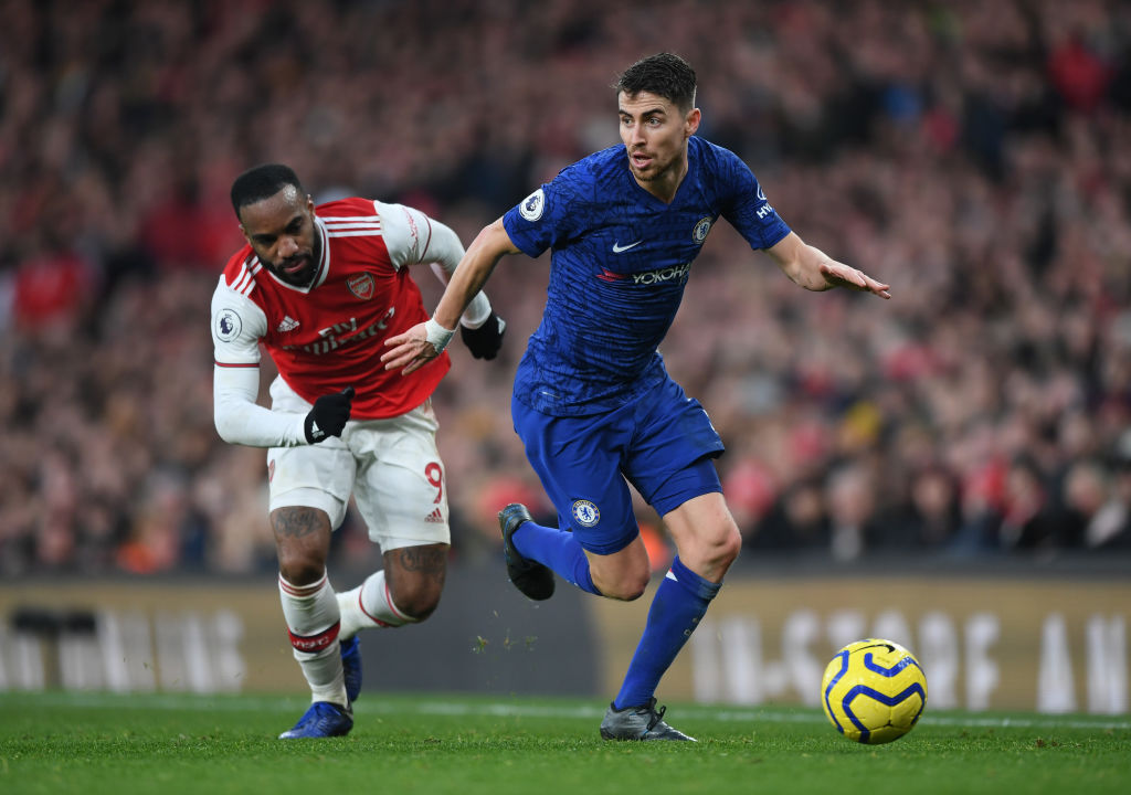 LONDON, ENGLAND - DECEMBER 29: Jorginho of Chelsea is closed down by Alexandre Lacazette of Arsenal during the Premier League match between Arsenal FC and Chelsea FC at Emirates Stadium on December 29, 2019 in London, United Kingdom. (Photo by Shaun Botterill/Getty Images)
